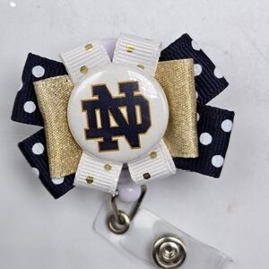 University of Notre Dame Badge Reel Alumni Souvenir NCAA ND Fighting Irish ID